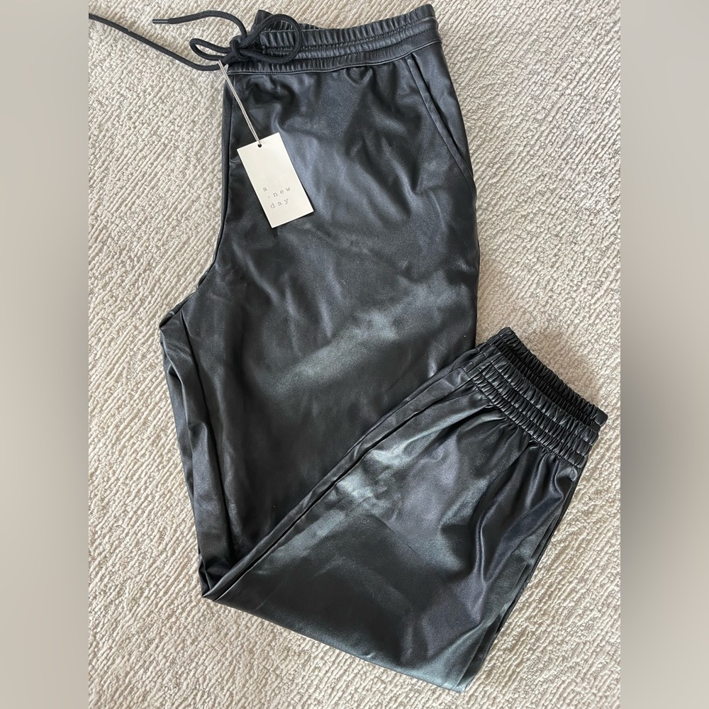 A new day faux leather joggers. Size M.  Brand new with tags